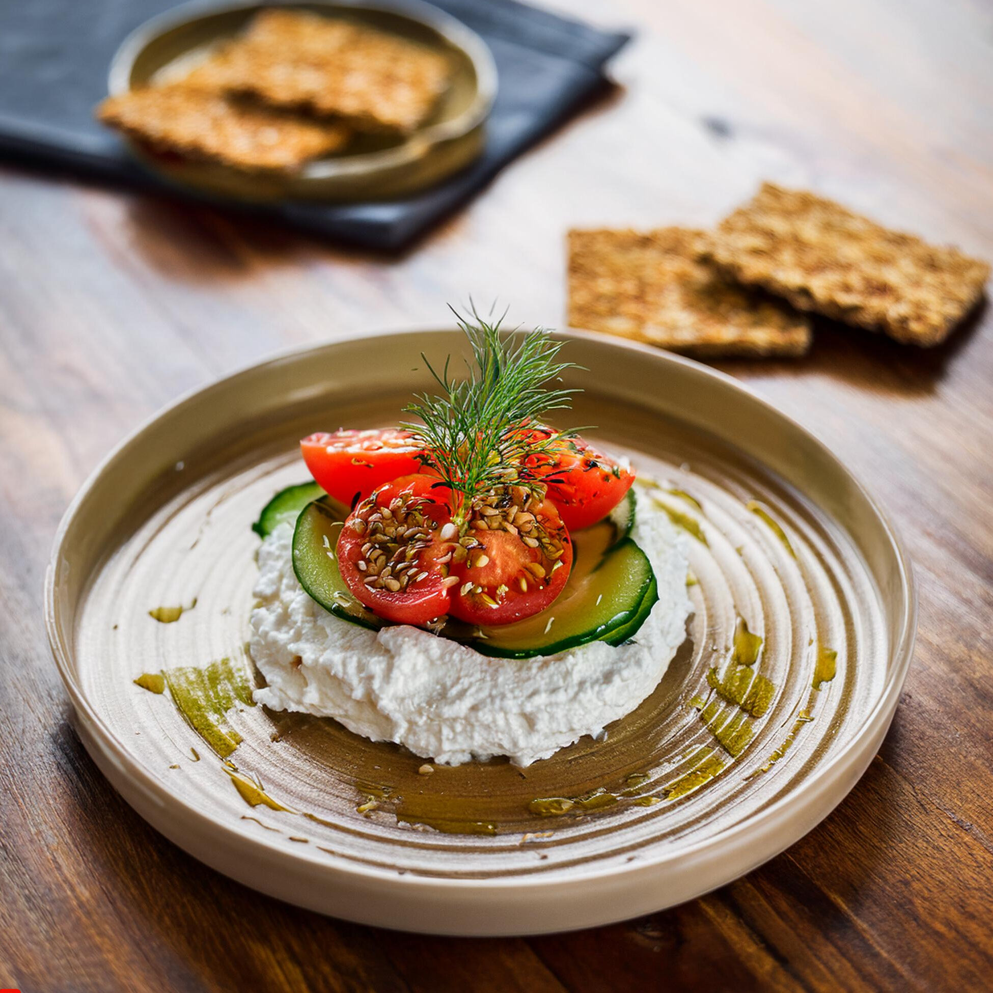 Cottage cheese with cucumbers, tomatoes, and fresh dill.